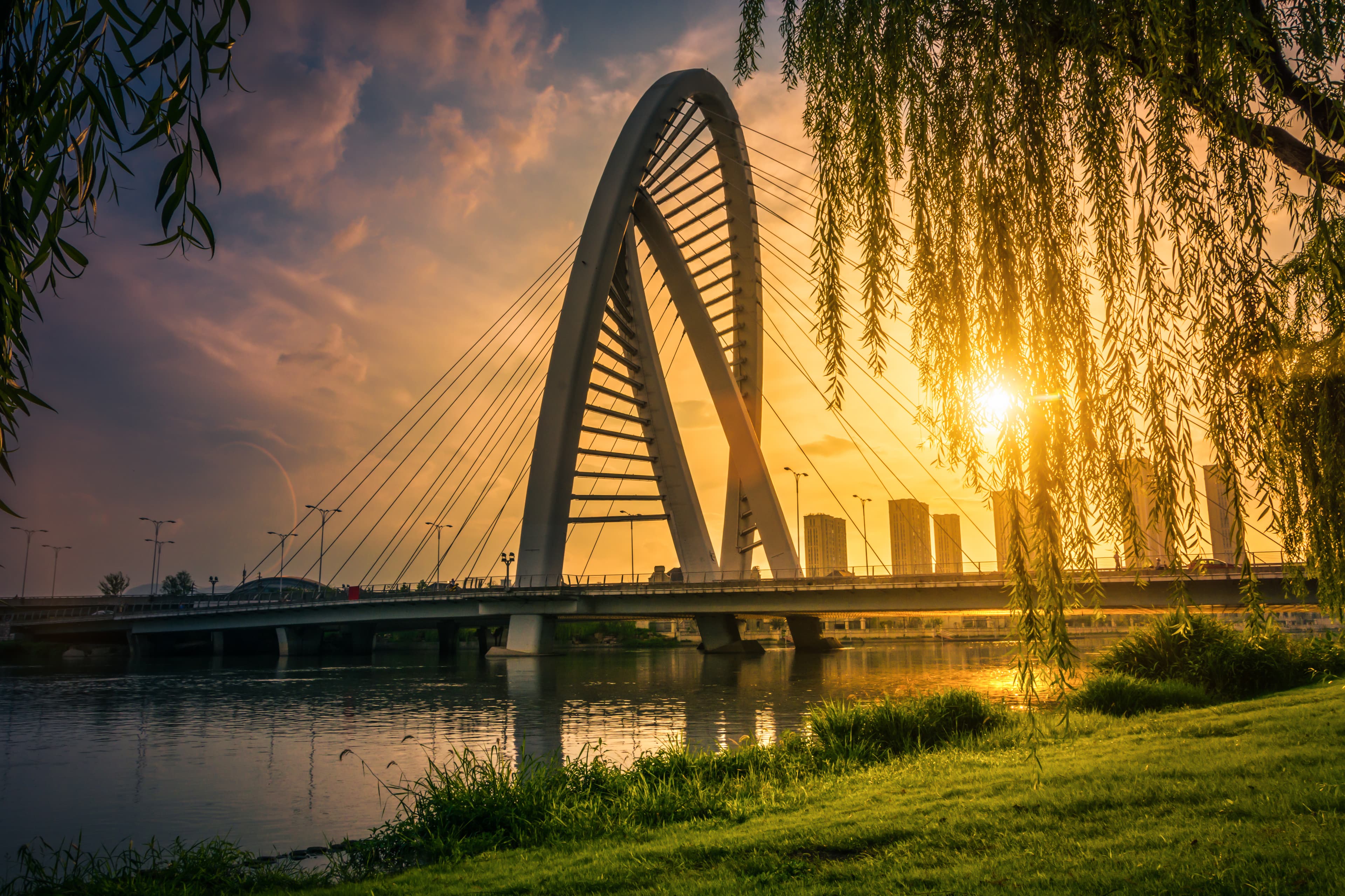 Bridge with city skyline